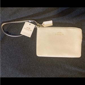 Coach wristlet zipper wallet.
